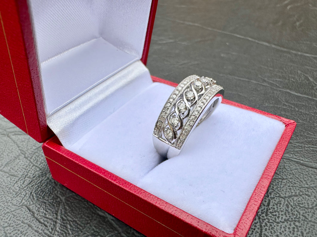 #654 - 14kt White Gold, .47ct Diamond, Size 7
