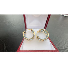 Load image into Gallery viewer, #526 - 14kt Yellow Gold, Blue Topaz Huggy Earrings
