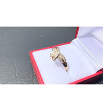 Load image into Gallery viewer, #481 - 10kt Yellow Gold, Diamond Baguette Twist Band, Size 8 1/2
