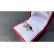 Load image into Gallery viewer, #481 - 10kt Yellow Gold, Diamond Baguette Twist Band, Size 8 1/2
