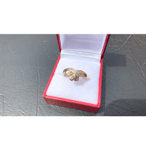 Load image into Gallery viewer, #481 - 10kt Yellow Gold, Diamond Baguette Twist Band, Size 8 1/2
