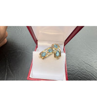 Load image into Gallery viewer, #526 - 14kt Yellow Gold, Blue Topaz Huggy Earrings
