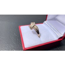 Load image into Gallery viewer, #481 - 10kt Yellow Gold, Diamond Baguette Twist Band, Size 8 1/2
